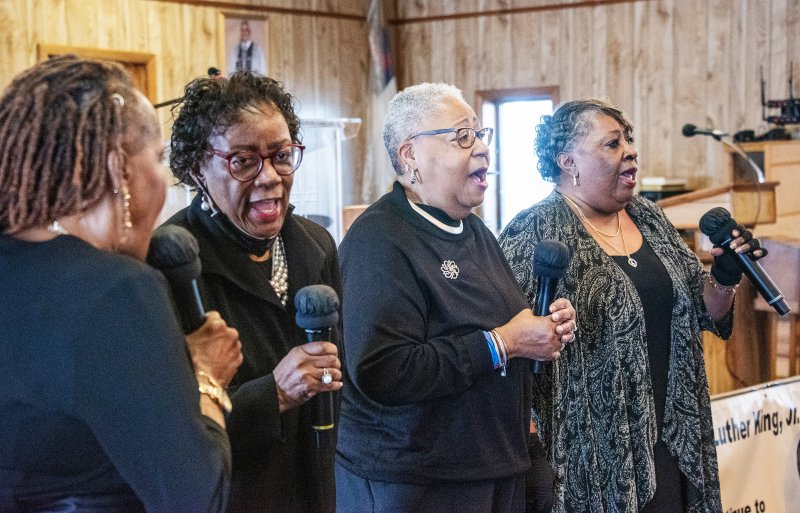 Members of the Daniels Sisters Gospel Singers of Lincoln sing during the Jan. 19 worship service honoring the Rev. Dr. Martin Luther King Jr. at Friendship Baptist Church in Lewes. Shown are (l-r) Kim Daniels, the Rev. Jeanel Starling, Roslyn Harris and the Rev. Cynthia Williams. DENY HOWETH PHOTOS